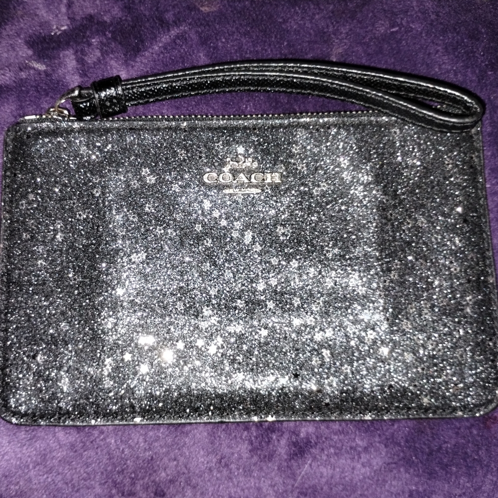 Coach glitter and stars wristlet